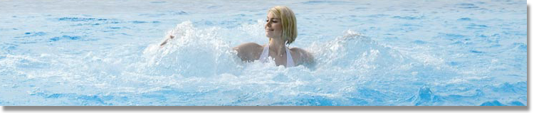 blonde splashing in spa pool